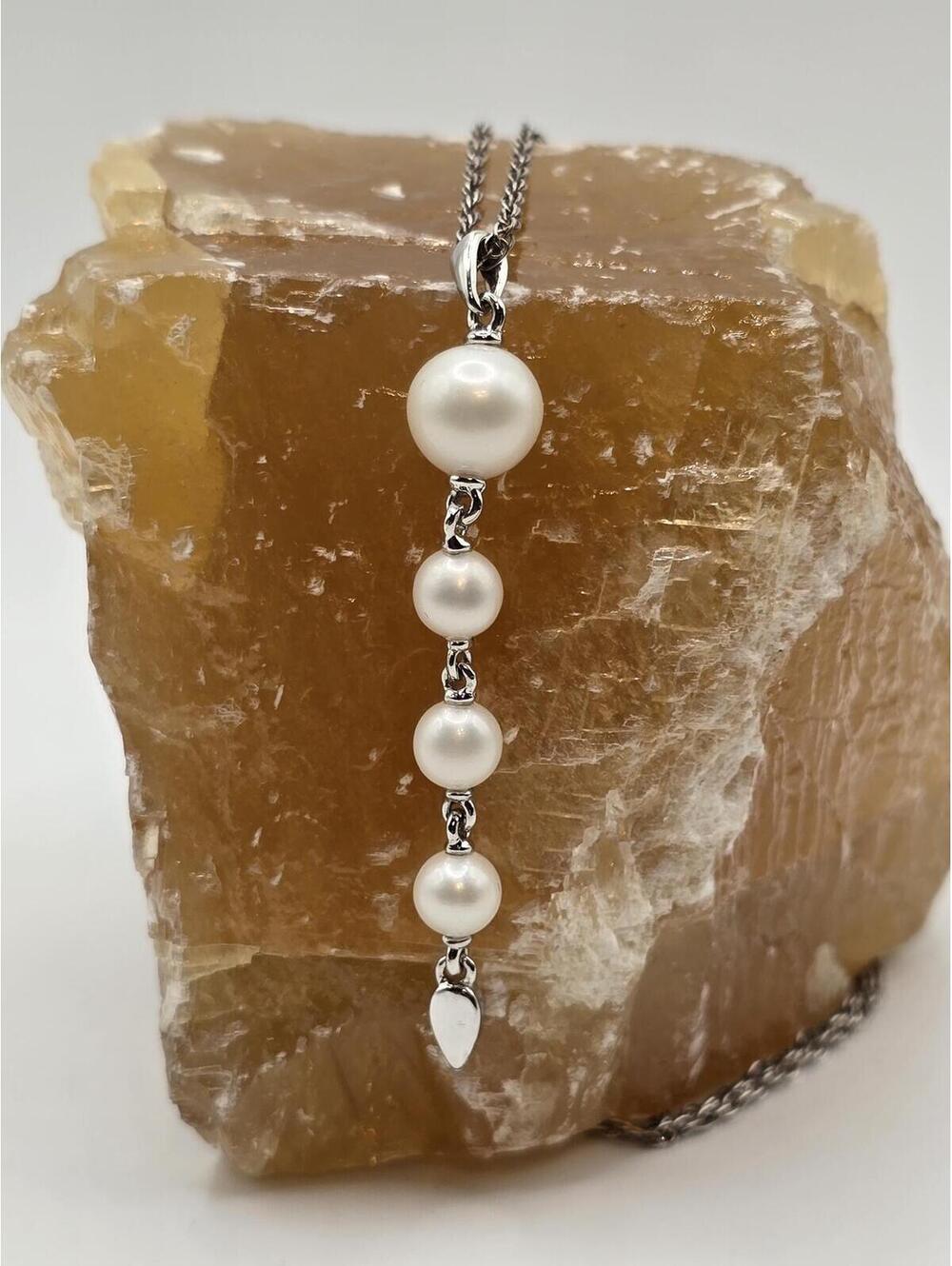 Freshwater pearl drop necklace with a sterling silver chain.